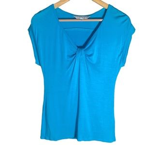 Trina Turk cap sleeve v neck top- women’s size small- aqua blue